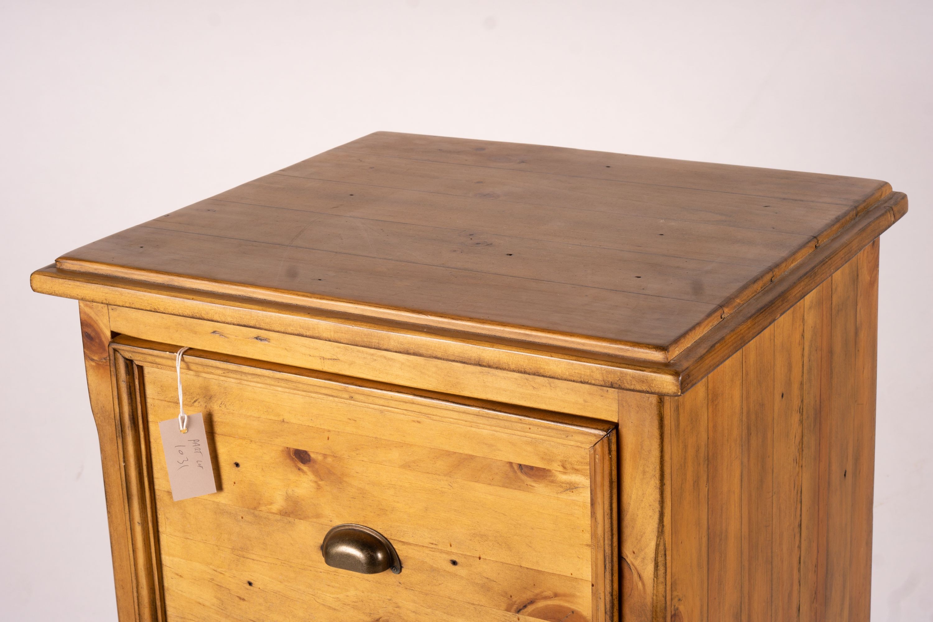 A reproduction pine kneehole desk, width 174cm, depth 79cm, height 86cm together with a matching pine three drawer filing cabinet